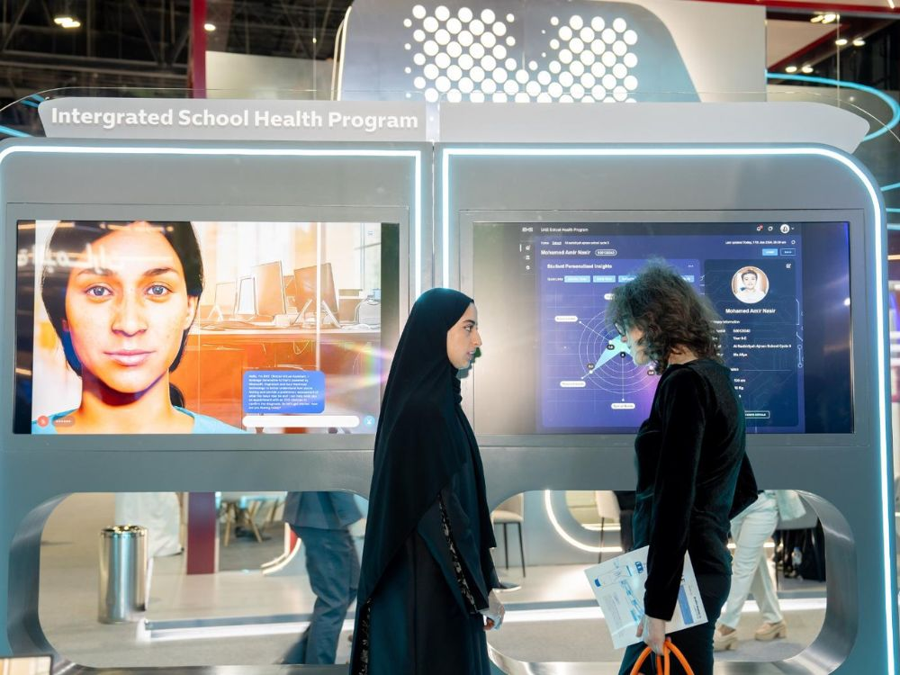 5. Parent receiving health update via school-health app under EHS measures UAE schools