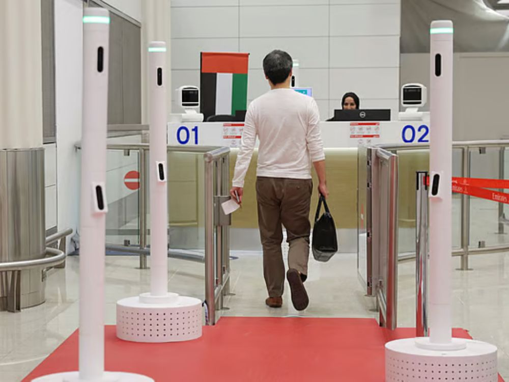 "Traveler at airport under updated UAE sponsorship rules for family and friends"