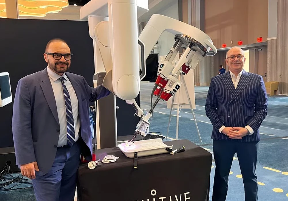 Sherif Beshara (right), Group CEO, American Hospital Dubai and Dr Hatem Moussa, Chief of Surgery and Robotics, American Hospital Dubai stand next to the Da Vinci SP (Single Port) robotic surgical system