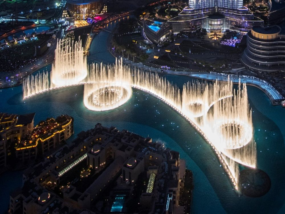 1. "Dubai Fountain reopening with vibrant water and light show"