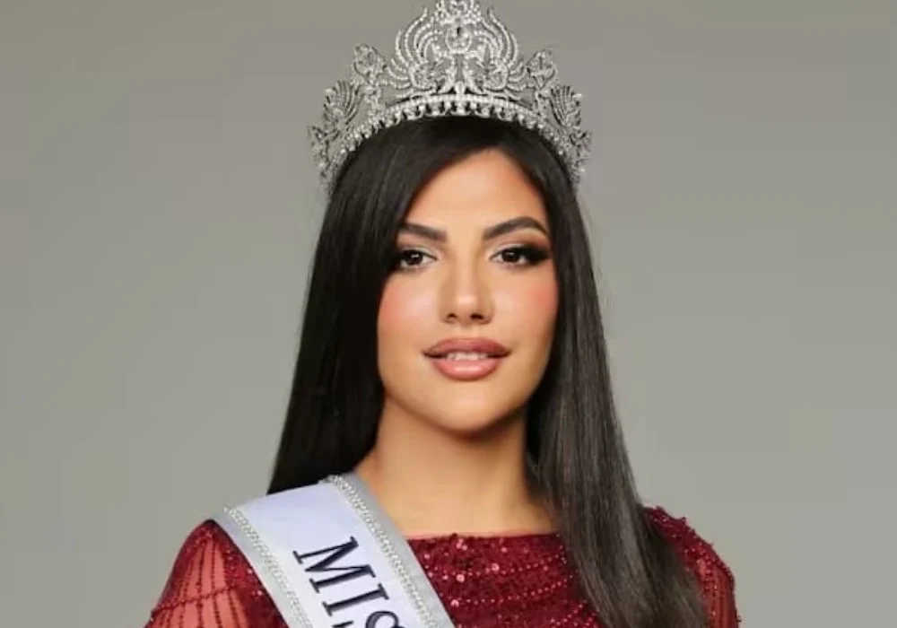 “Mariam Mohamed Miss Universe UAE flag bearer crowned 2025 with UAE flag”
