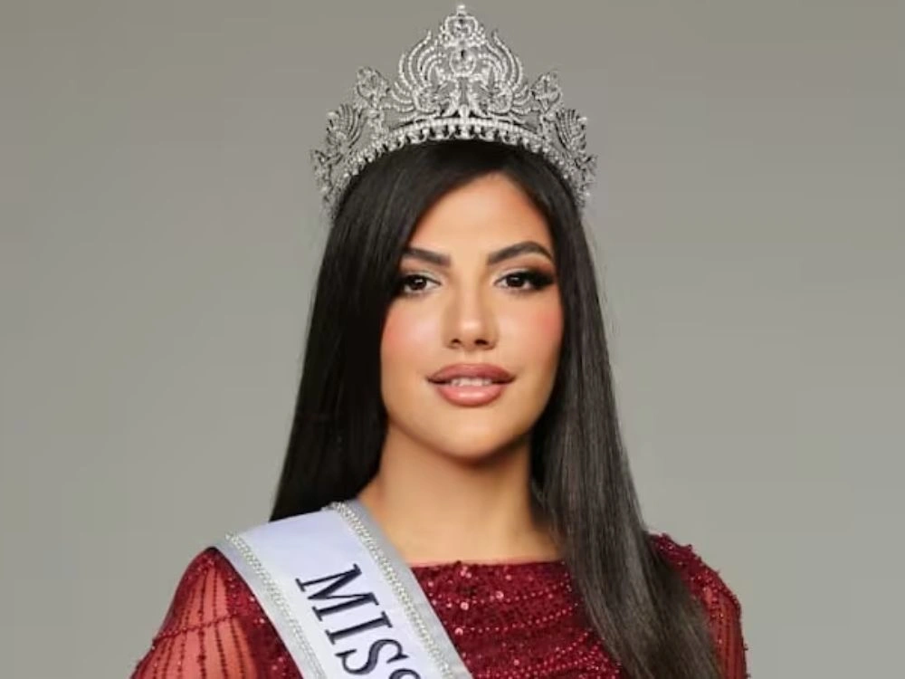 “Mariam Mohamed Miss Universe UAE flag bearer crowned 2025 with UAE flag”