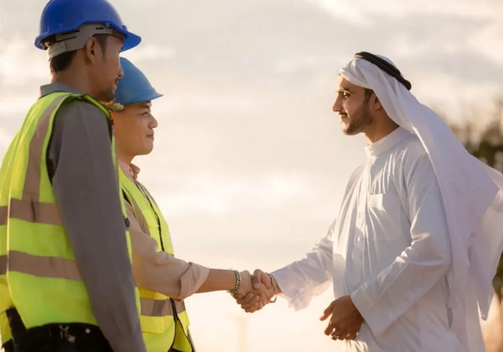 Image showing satisfied Employees and Employer as UAE has the lowest labor dispute rates.